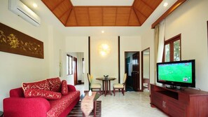 Royal Villa, Pool View | Living area | 32-inch LCD TV with cable channels, TV - Bhumlapa Garden Resort (Koh Samui)