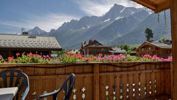 Quadruple Room, Terrace Mont-Blanc View | In-room safe, desk, soundproofing, iron/ironing board