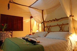 Cabaña superior | Minibar, caja fuerte, ropa de cama