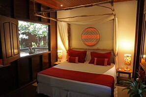 Cabana superior | Frigobar, cofres nos quartos, roupa de cama