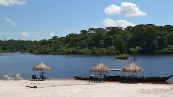 Private beach, white sand, sun loungers, beach towels