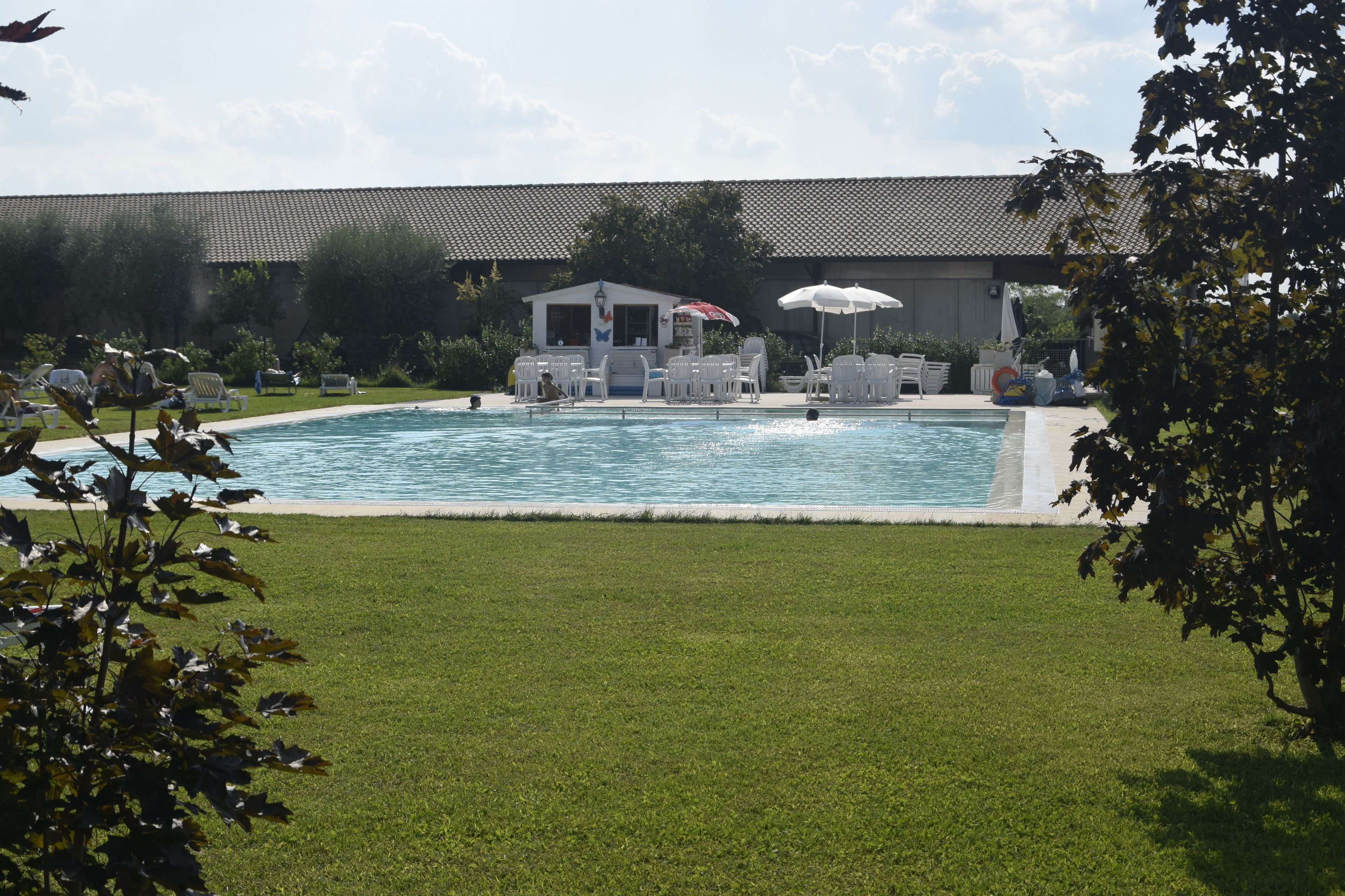 outdoor pool, pool umbrellas, pool loungers