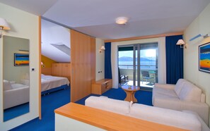 Suite panorámica | Área de sala de estar | Televisión LCD