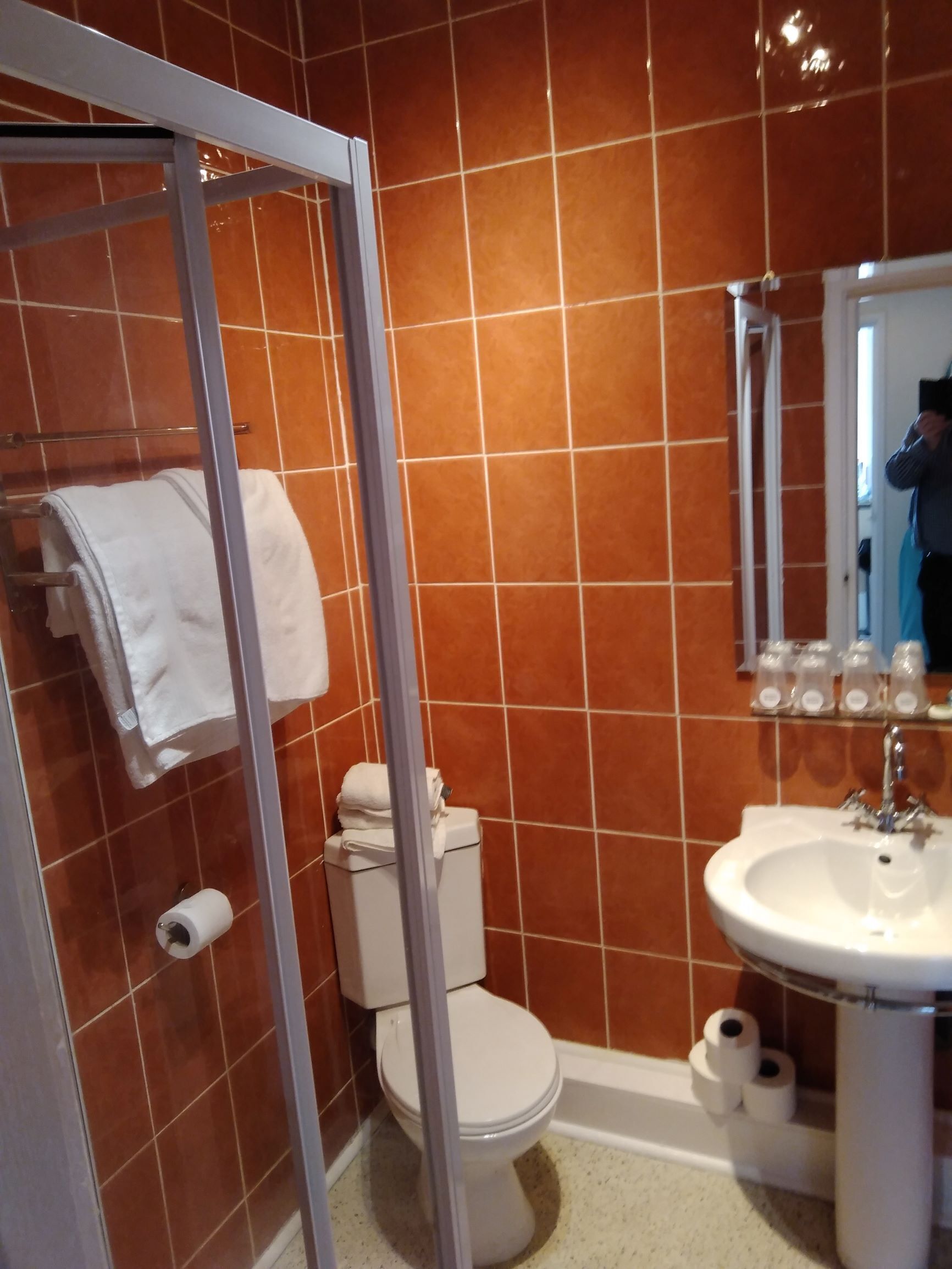 rainfall showerhead, hair dryer, towels, soap