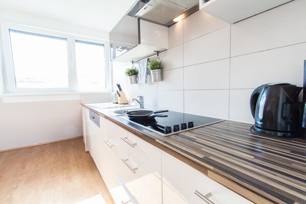 Apartamento grand (Mandl) | Cozinha privada | Geladeira, micro-ondas, cooktop, lava-louças