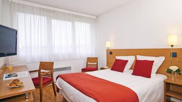 Desk, laptop workspace, free WiFi, bed sheets