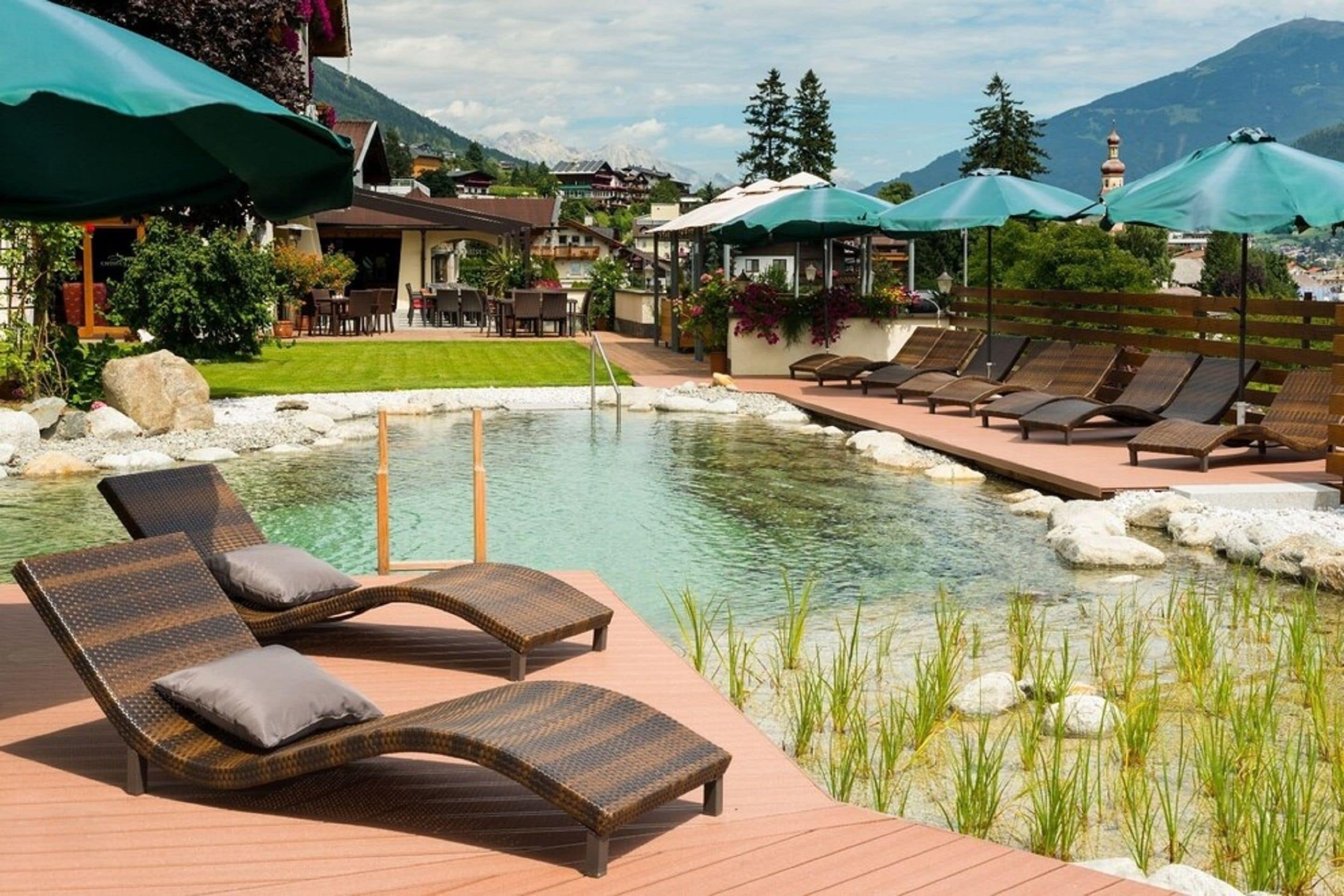 indoor pool, pool umbrellas, pool loungers