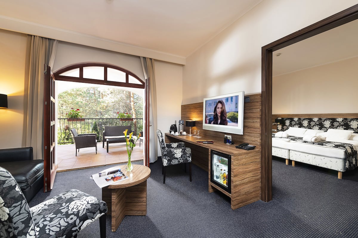 Superior Suite | Living area | 51-cm LED TV with digital channels, TV