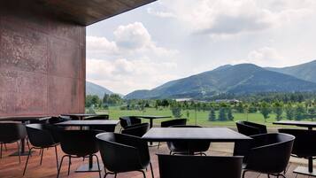 Breakfast, lunch, dinner served; golf course views