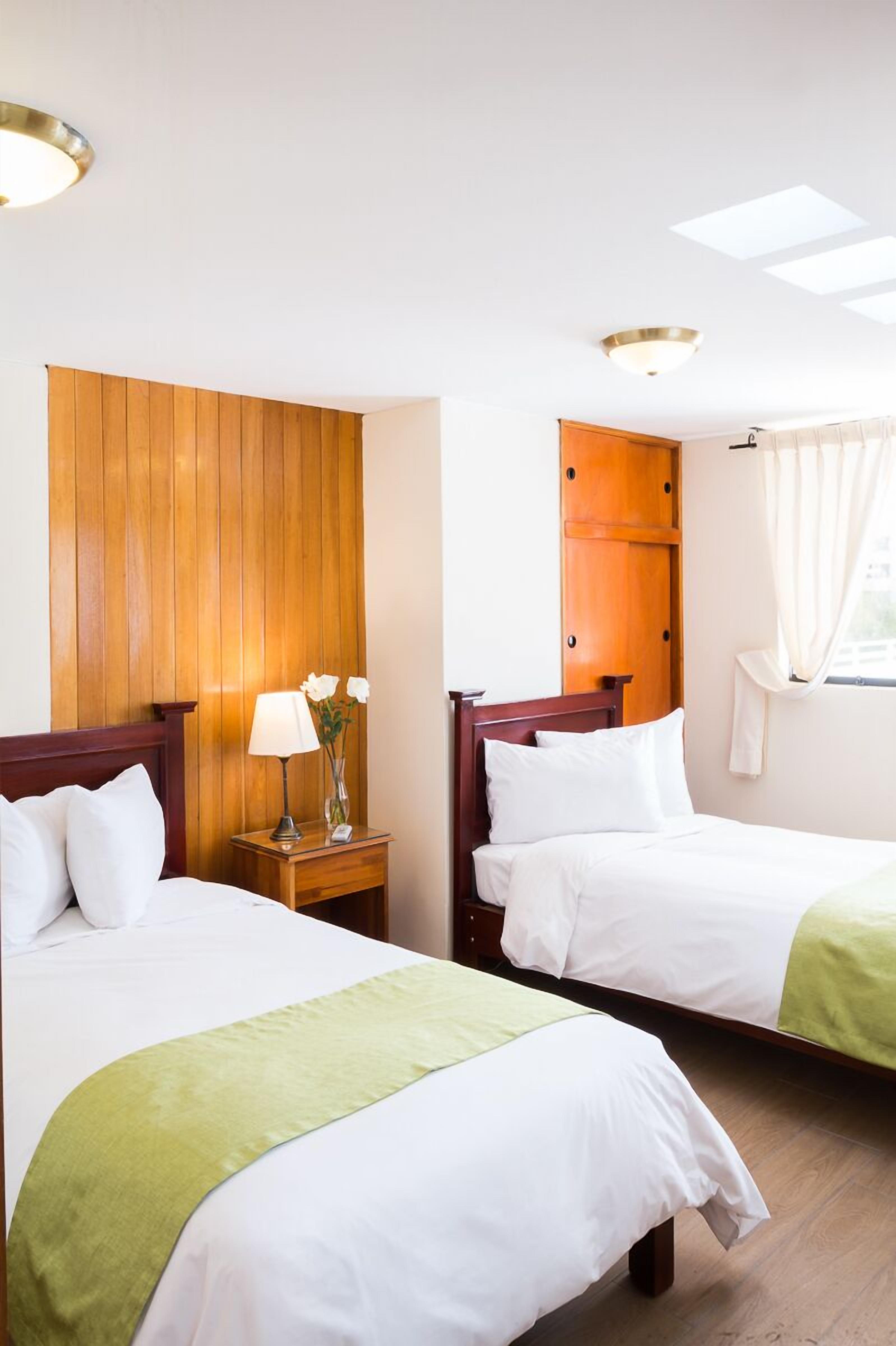 family room, mountain view | premium bedding, down duvets, in-room safe, free wifi