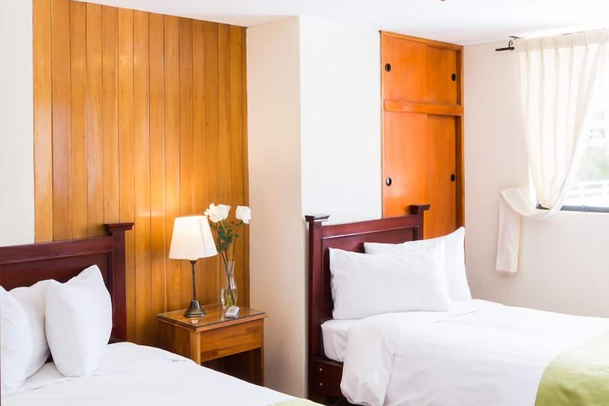 family room, mountain view | premium bedding, down duvets, in-room safe, free wifi