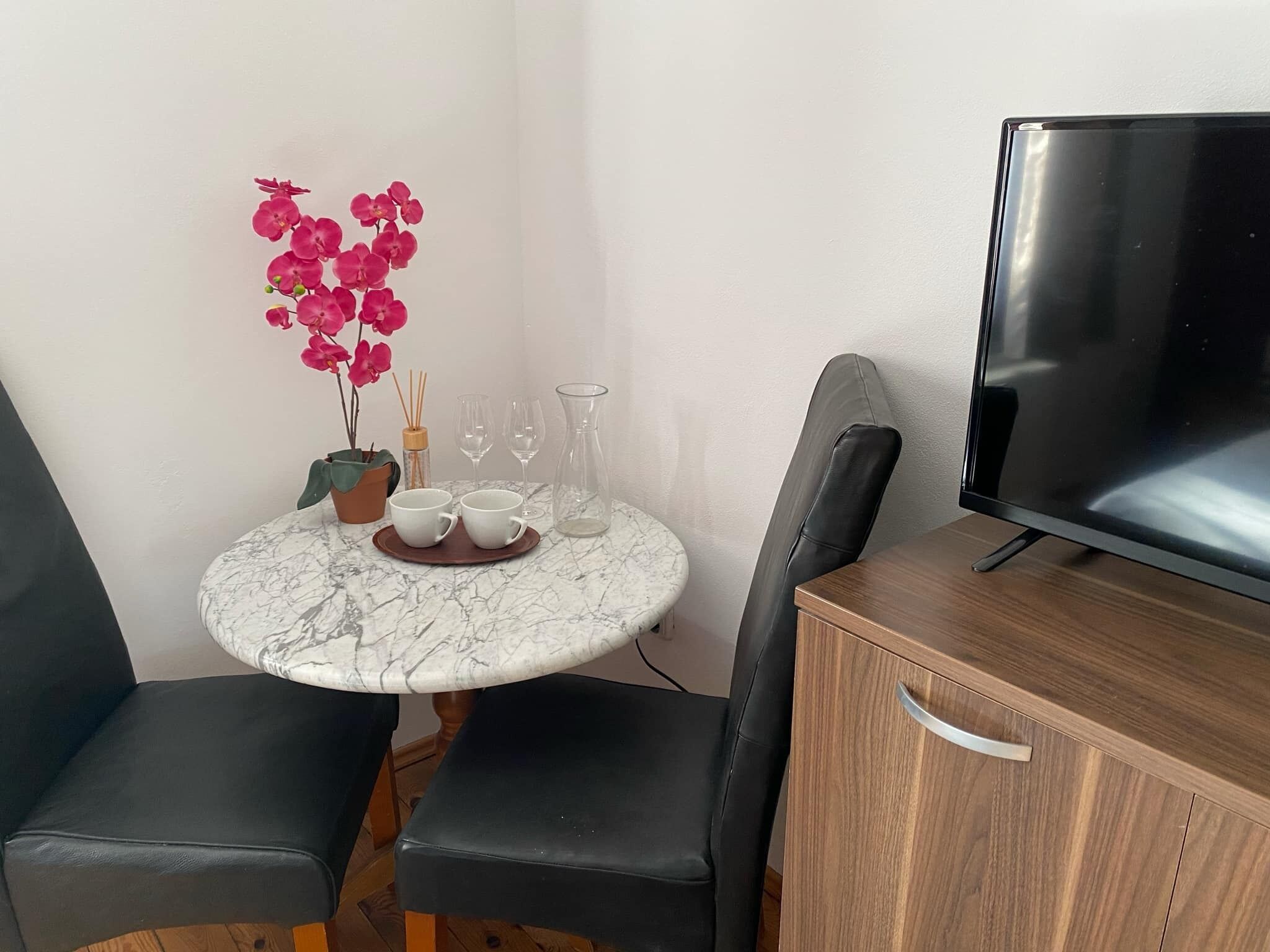 Double or Twin Room | Living area | TV