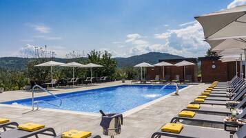 Seasonal outdoor pool, pool umbrellas, sun loungers