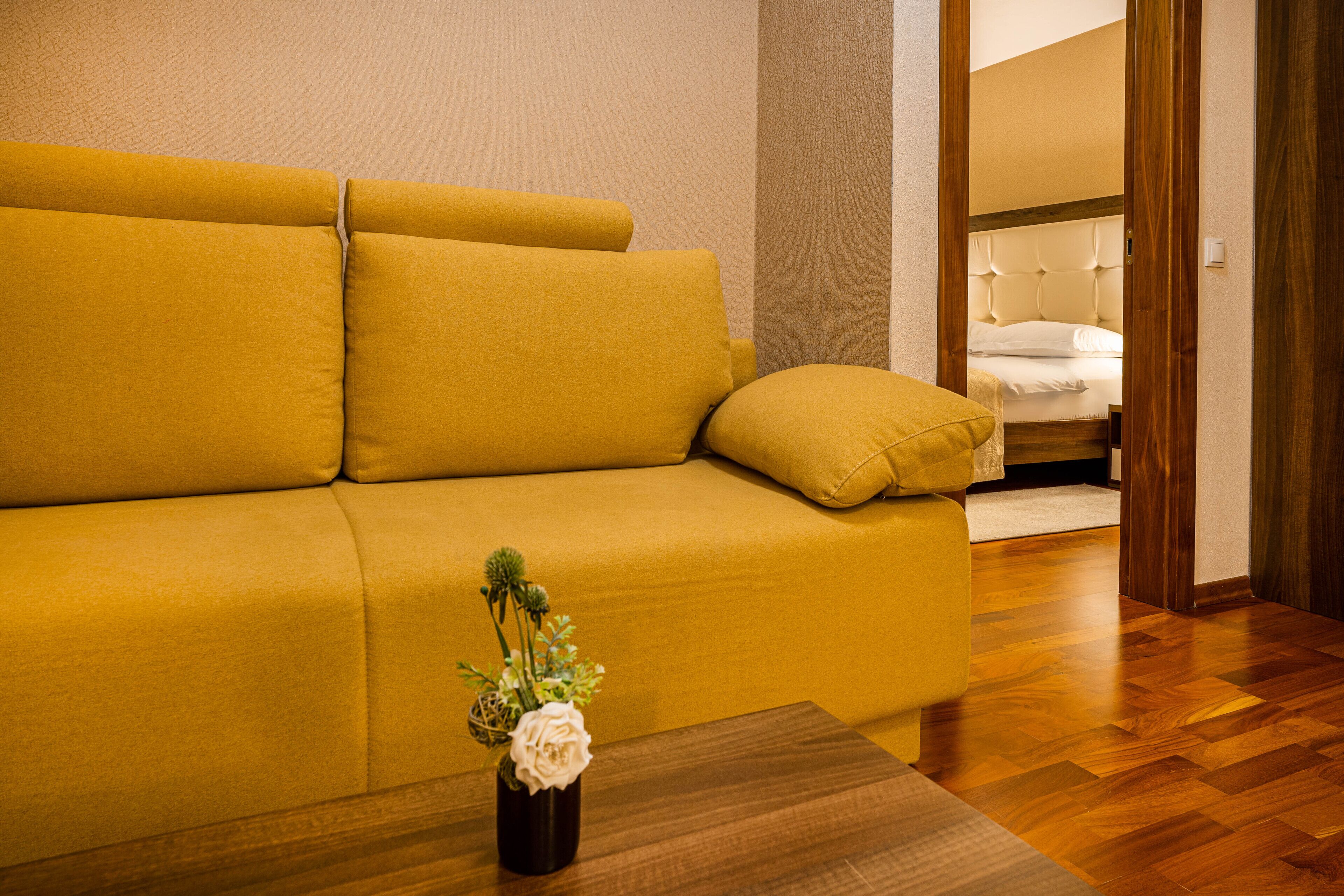 superior suite | living area | 127-cm lcd tv with satellite channels, tv, netflix