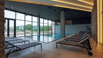 Indoor pool, seasonal outdoor pool, pool umbrellas, sun loungers
