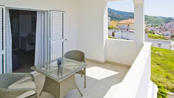 Comfort Double Room, Terrace, Partial Sea View | Hypo-allergenic bedding, desk, iron/ironing board, free WiFi