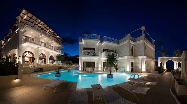 Outdoor pool, open 8 AM to 8 PM, sun loungers
