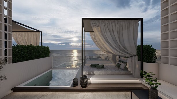 Un balcón moderno con vistas al mar, una piscina y una zona de estar con cojines.