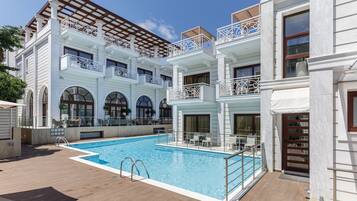 Outdoor pool, open 8 AM to 8 PM, sun loungers