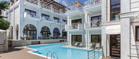 Outdoor pool, open 8 AM to 8 PM, sun loungers