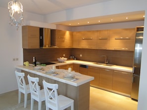 Villa, 4 Bedrooms | Shared kitchen facilities | Full-size fridge, oven, stovetop, dishwasher