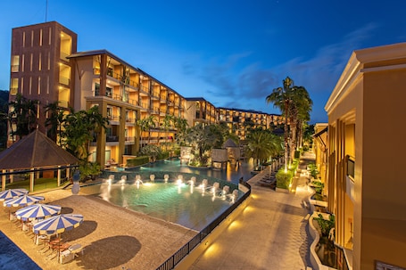 3 outdoor pools, pool umbrellas, sun loungers. Rawai Palm Beach Resort