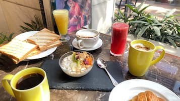 Daily buffet breakfast (INR 1500 per person)