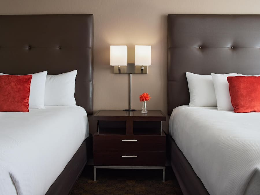 Premium bedding, down comforters, desk, laptop workspace