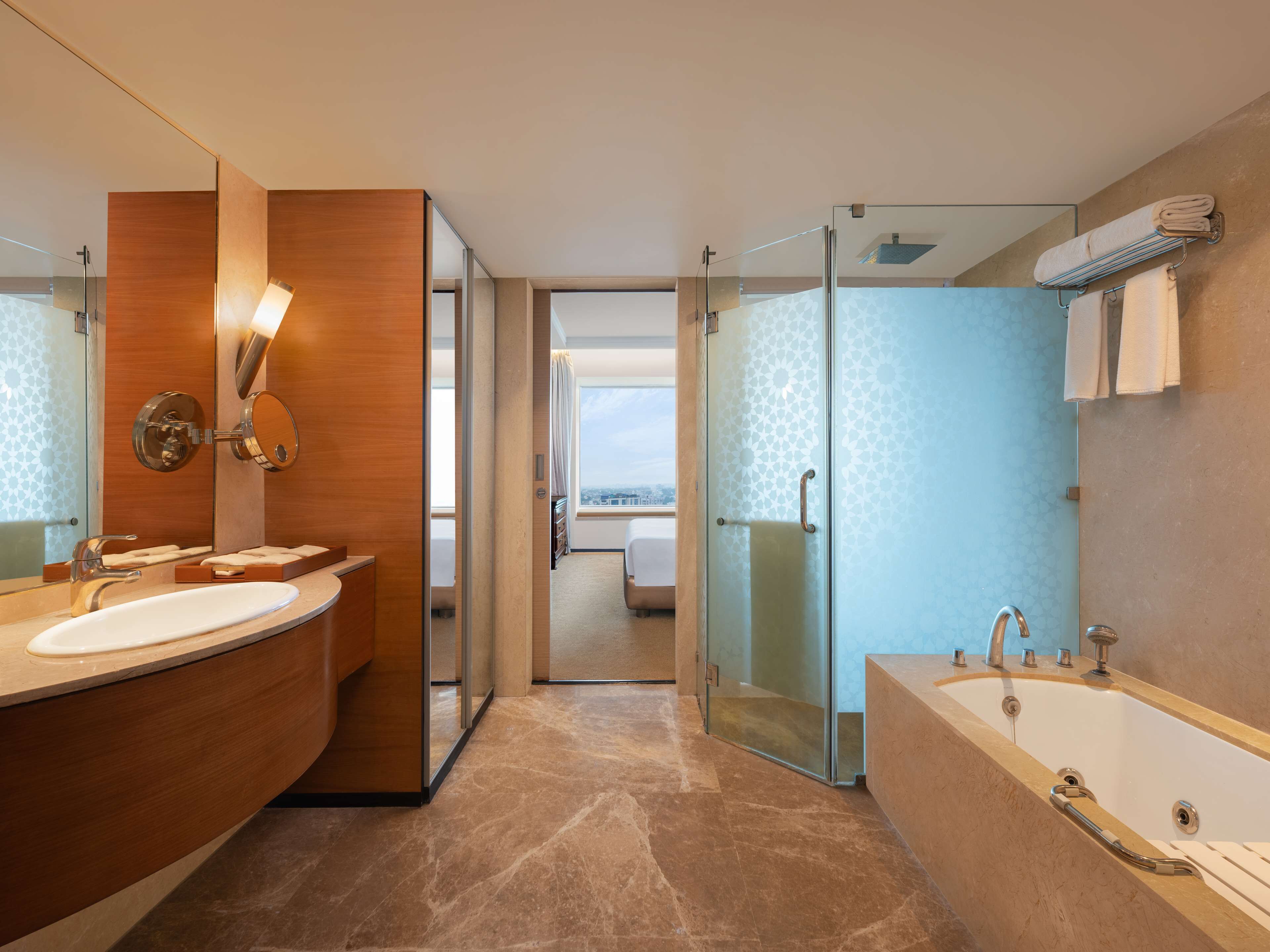 deluxe suite | bathroom | free toiletries, hair dryer, bathrobes, slippers