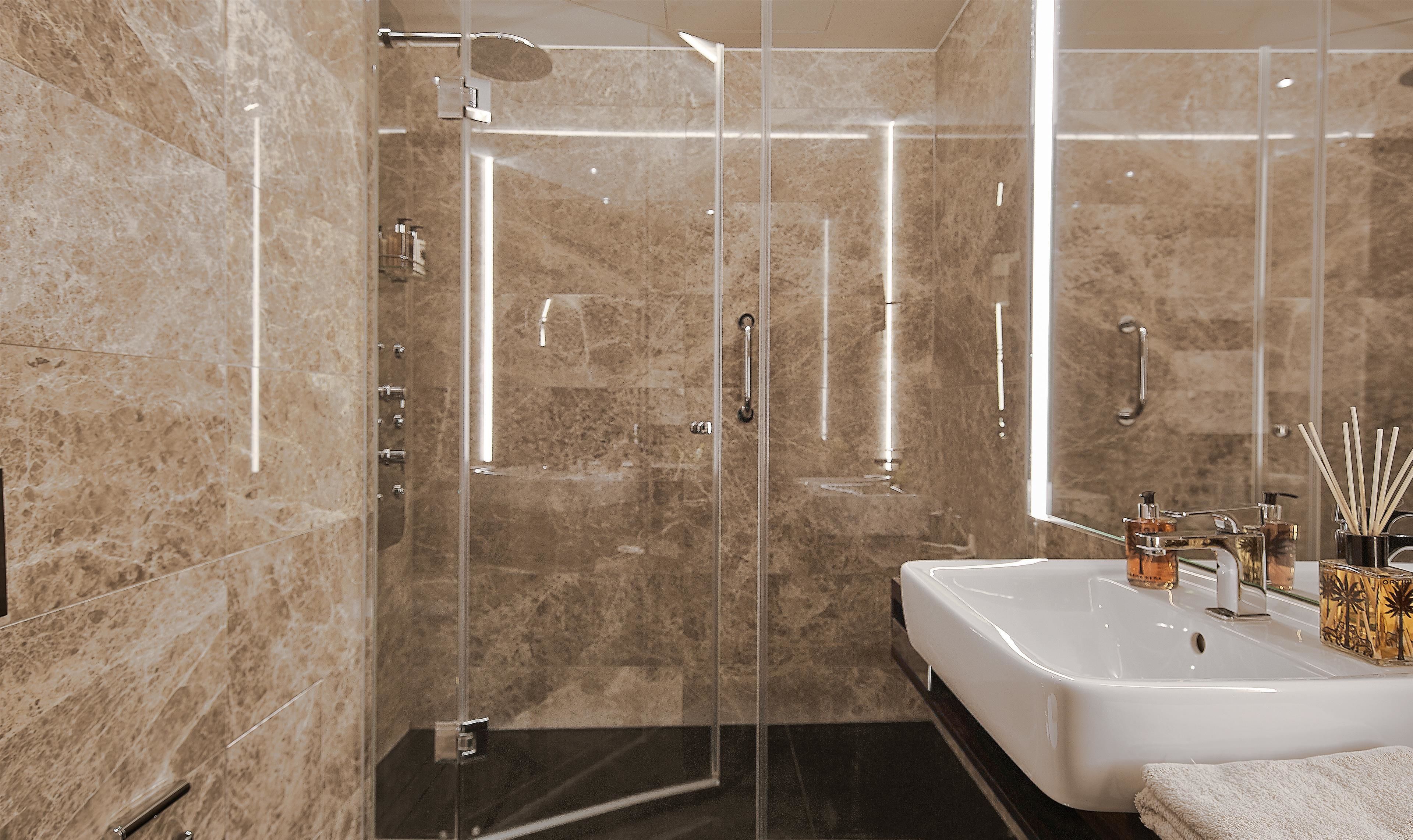 shower, rainfall showerhead, designer toiletries, hair dryer