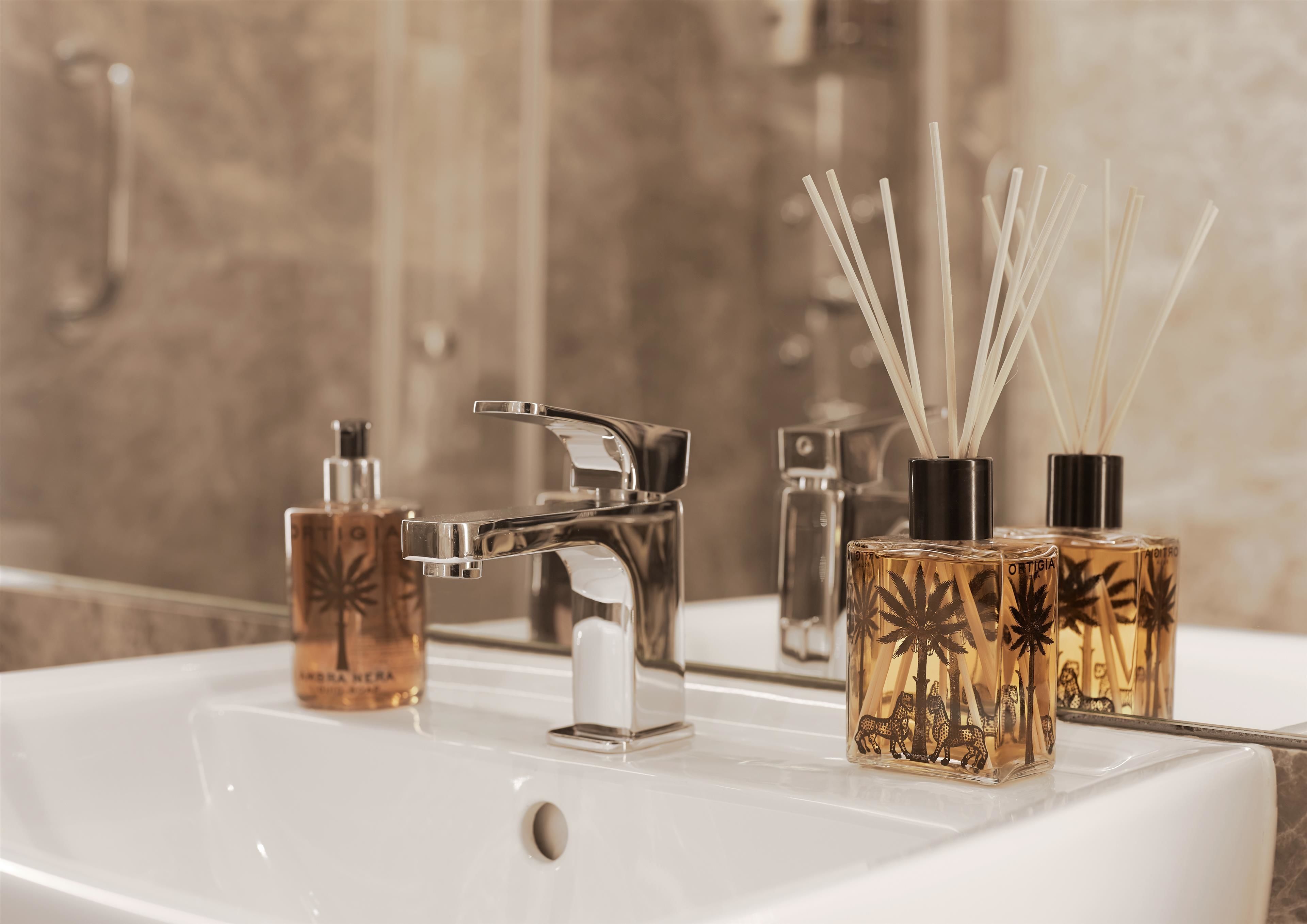 shower, rainfall showerhead, designer toiletries, hair dryer