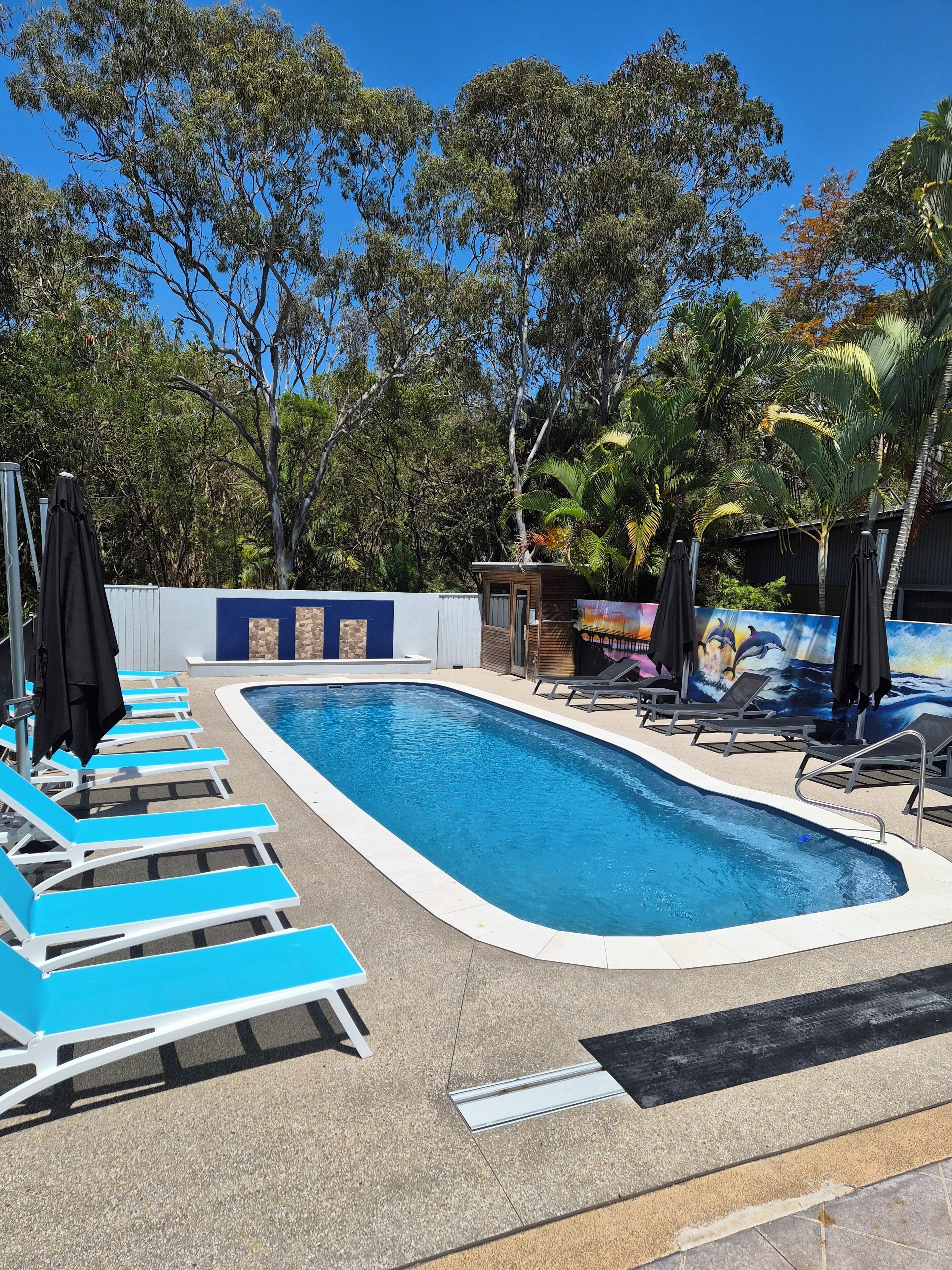 Outdoor pool, pool umbrellas, sun loungers