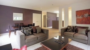 Standard Villa, 2 Bedrooms | Living area | 32-inch LCD TV with digital channels, TV, DVD player - Quarterdecks Retreat (Urangan)