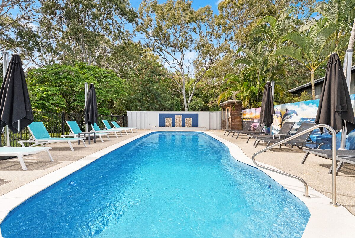 Outdoor pool, pool umbrellas, pool loungers