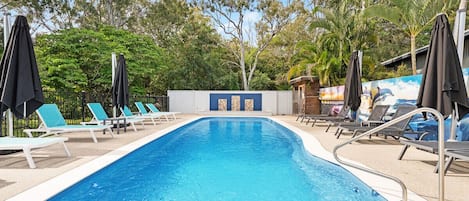 Outdoor pool, pool umbrellas, pool loungers