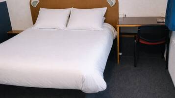 Desk, blackout drapes, free WiFi, bed sheets