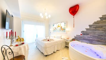 Suite Deluxe, baignoire à jets | 1 chambre, minibar, coffres-forts dans les chambres, bureau