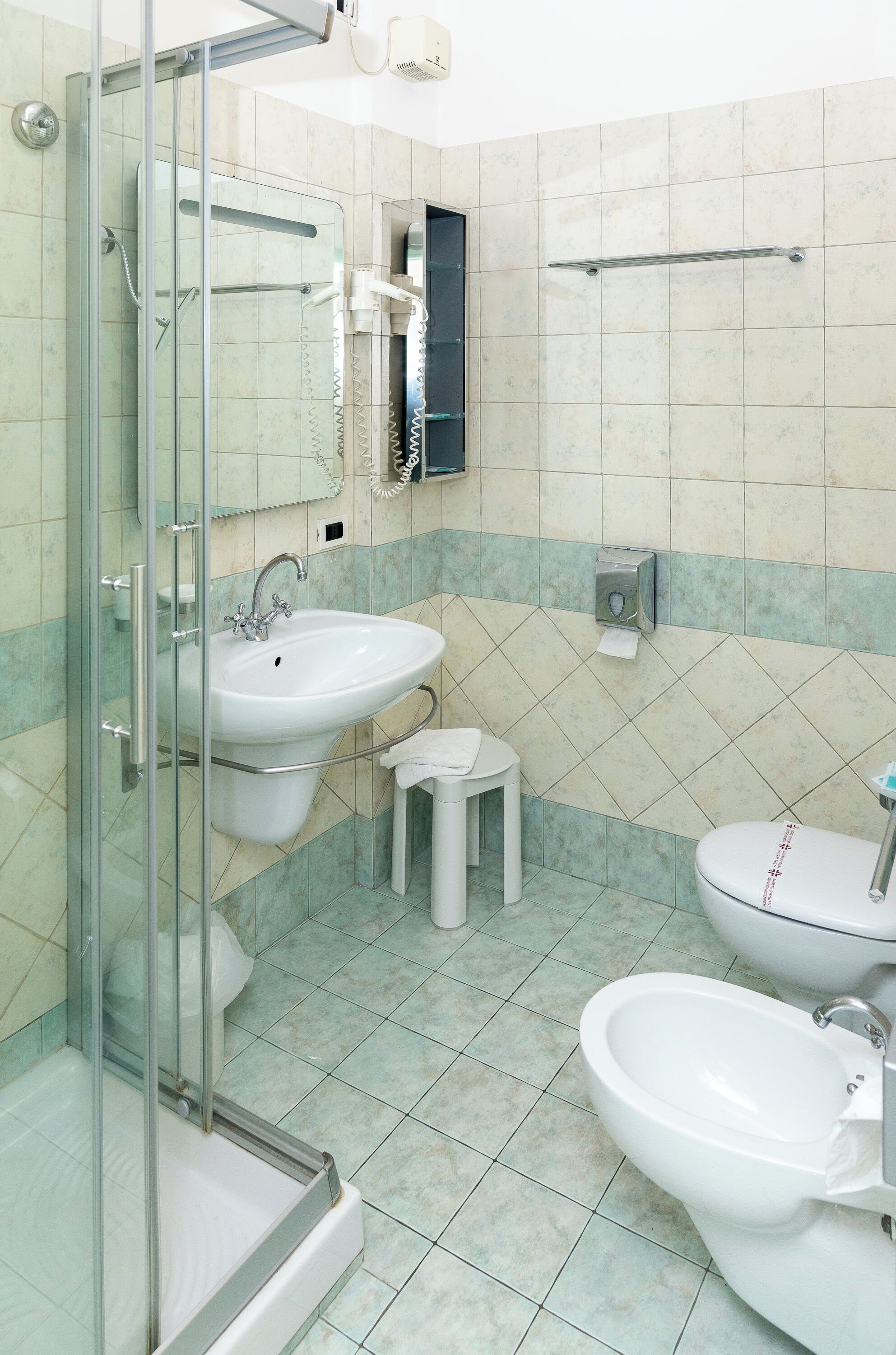 shower, free toiletries, hair dryer, slippers