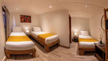 Standard Triple Room | In-room safe, individually decorated, individually furnished