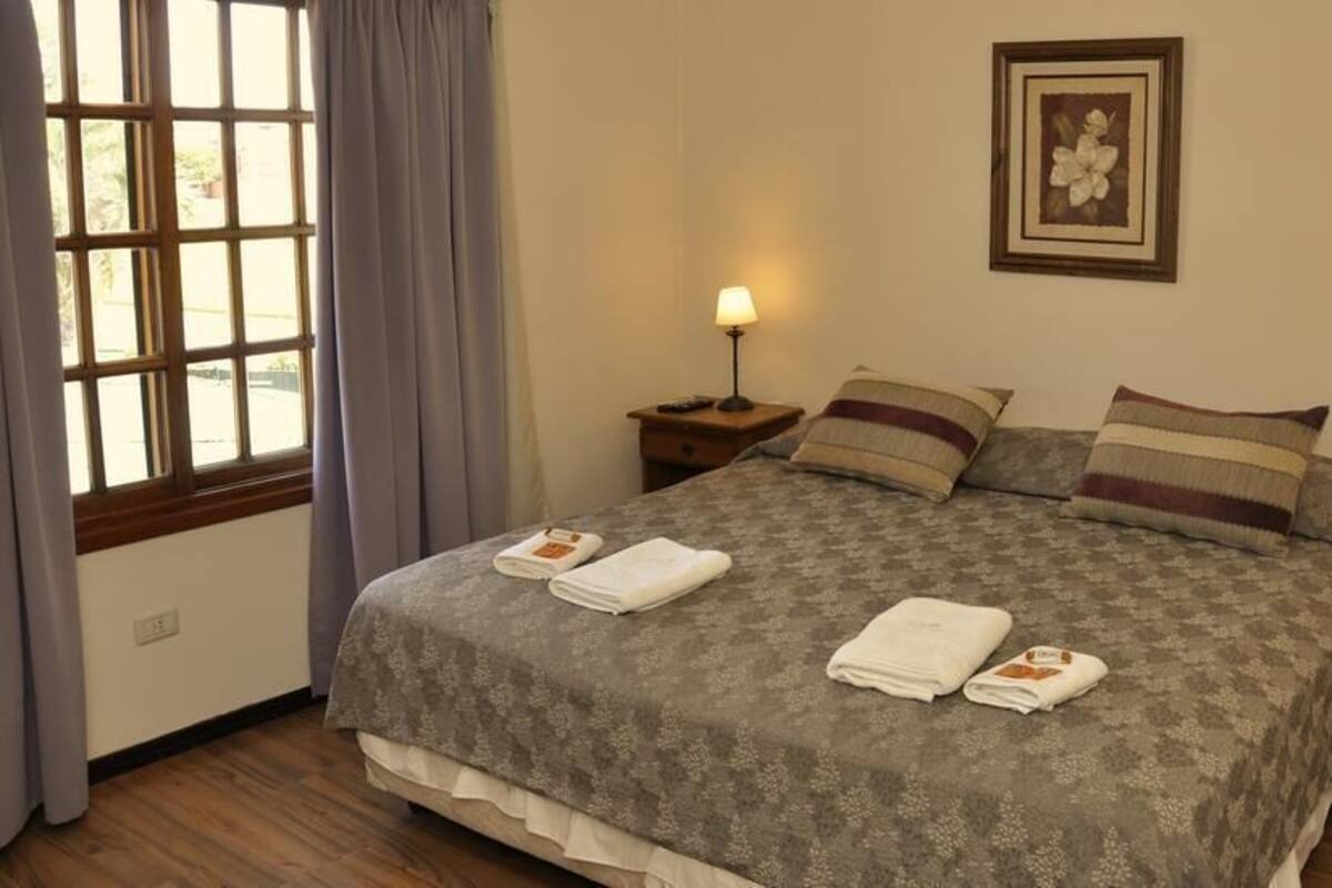 Premium bedding, down duvets, desk, laptop workspace