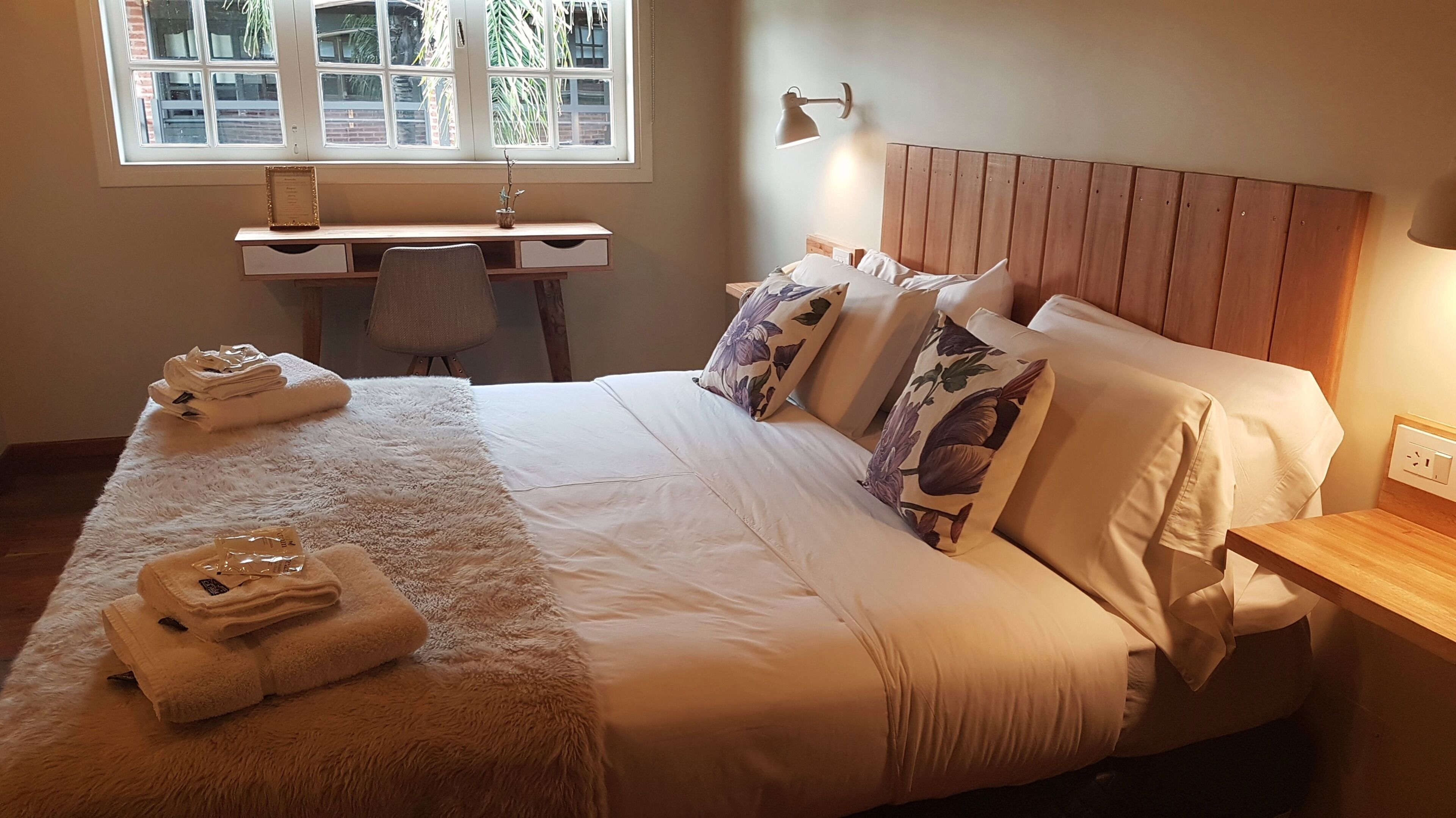 Premium bedding, down duvets, individually decorated