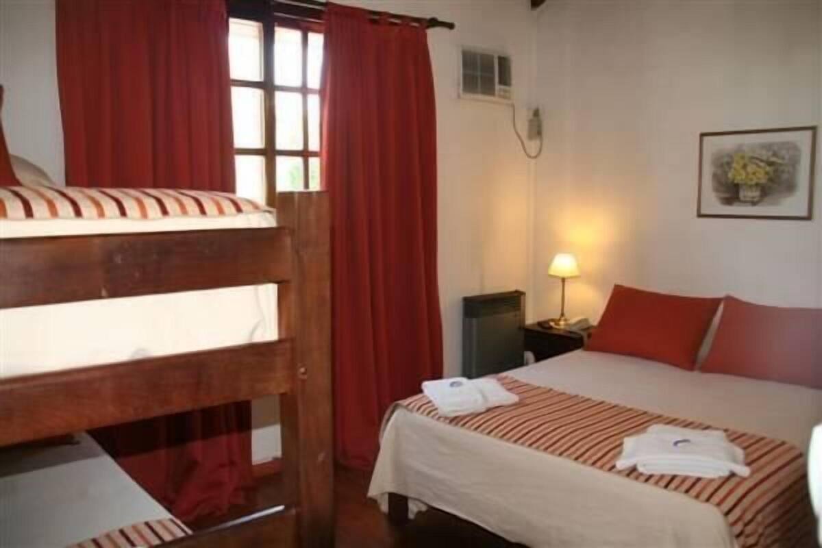 Premium bedding, down duvets, desk, laptop workspace