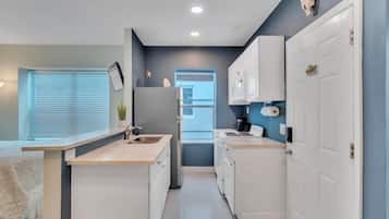 #4 = Seahorse Hideaway = 1 bedroom w/ queen sized bed and a futon couch | Private kitchen | Fridge, microwave, oven, stovetop