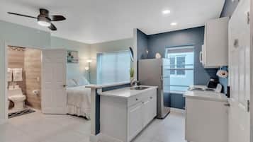 #4 = Seahorse Hideaway = 1 bedroom w/ queen sized bed and a futon couch | Living area | TV