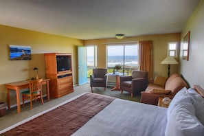 Standard Double Room | Living area | 36-inch flat-screen TV with cable channels, TV, DVD player