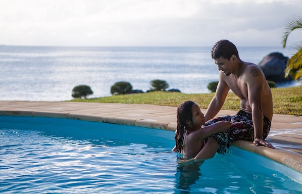 Outdoor pool, pool umbrellas, pool loungers