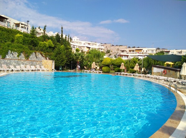 Indoor pool, 3 outdoor pools, open 7:00 AM to 8:00 PM, pool umbrellas