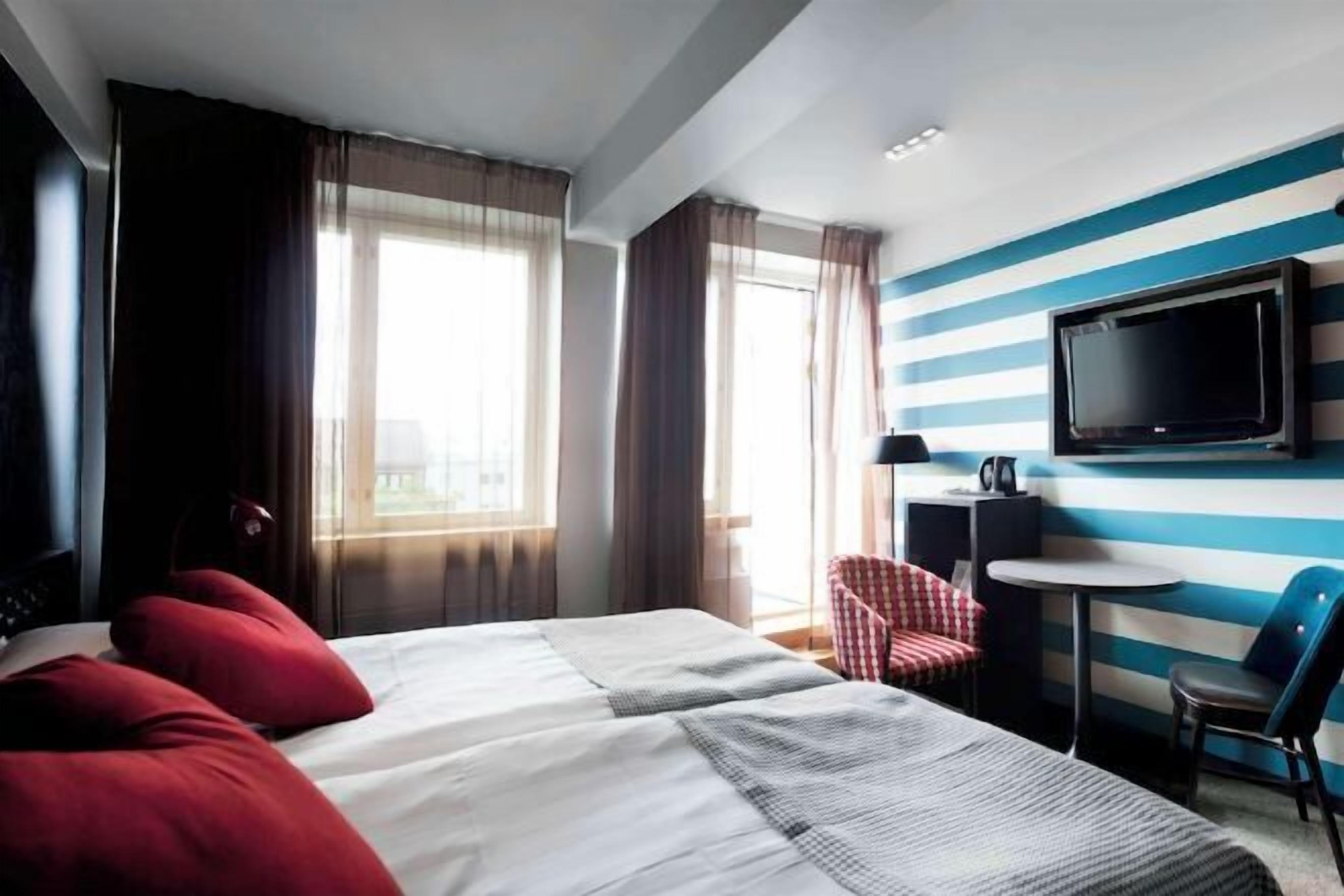 Een minibar, een kluis op de kamer, verduisterende gordijnen