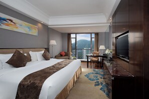 Premium bedding, pillow-top beds, minibar, in-room safe