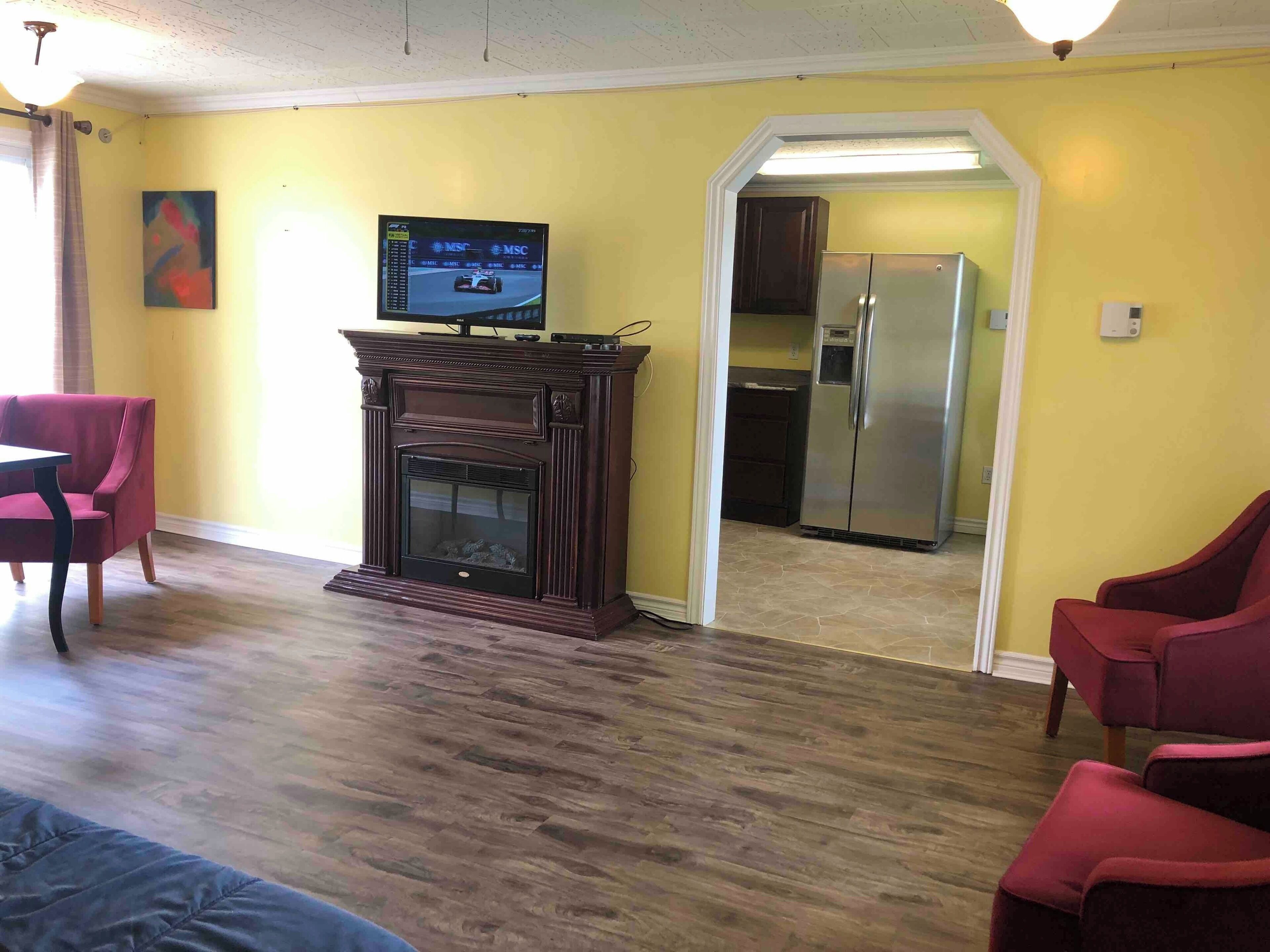 デラックス アパートメント | リビング エリア | 薄型テレビ